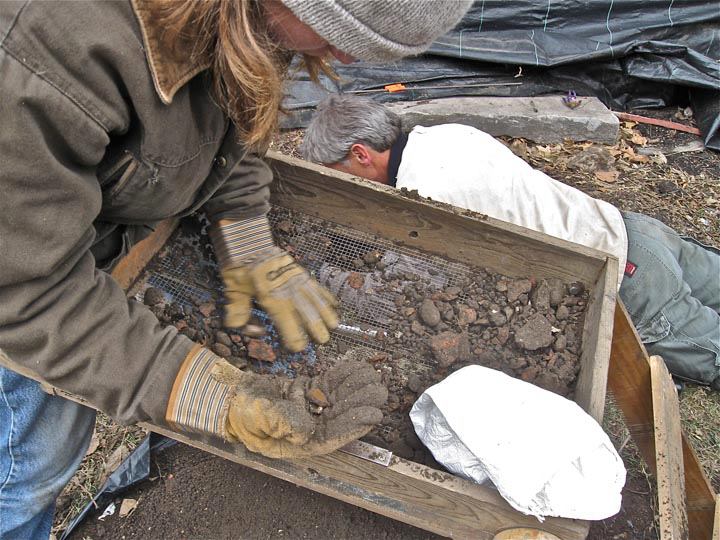 Sifting Deardurff hous soil for artifacts